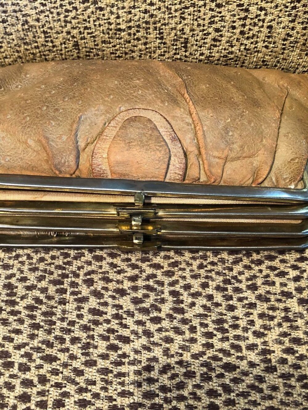 Vintage ostrich clutch with 4-part frame